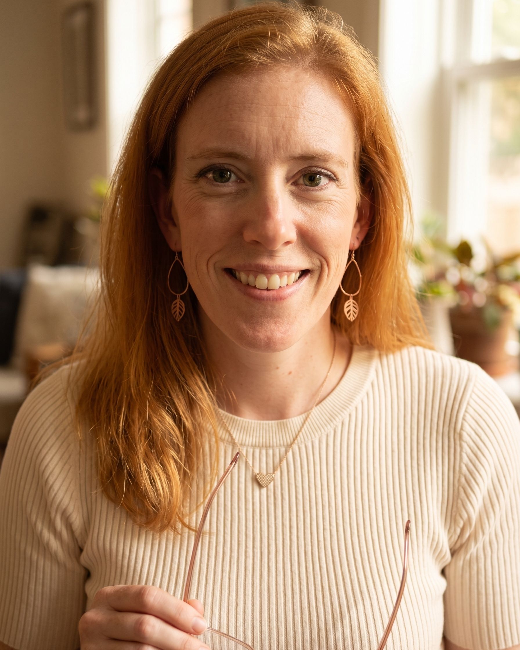 Holly smiling in conversation, ready to answer questions about her practice